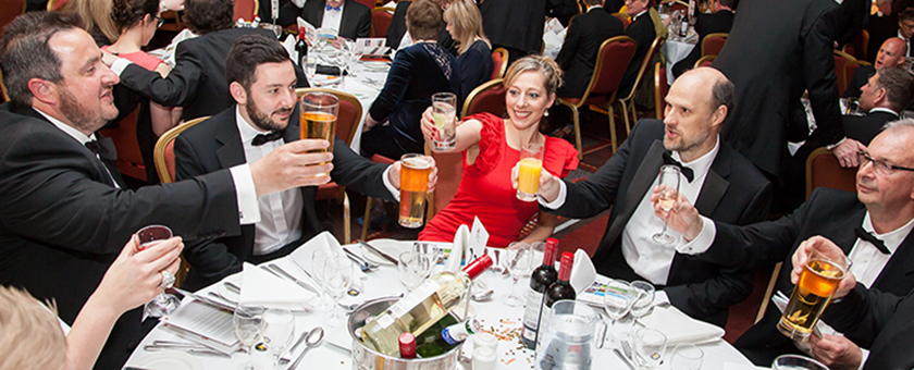 Attendees raising their glasses at the LABC awards night